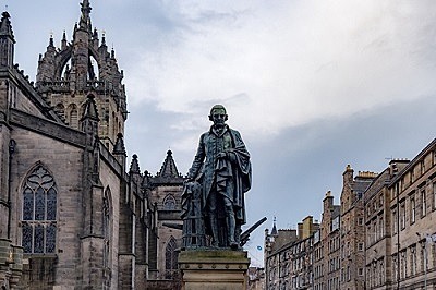 Adam Smith Statue in front of St Giles' Cathedral in Edinburgh, United kingdom.