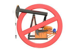 oil pumpjack with forbidden sign isolated on white background