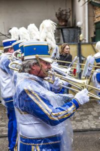 SCHWALBACH, GERMANY   FEBRUARY 27: The carnival  brass band  moves through the city on February 27, 2011 in Schwalbach, Germany. The Brass Band Rheinmain takes part as hosts at this annual event.