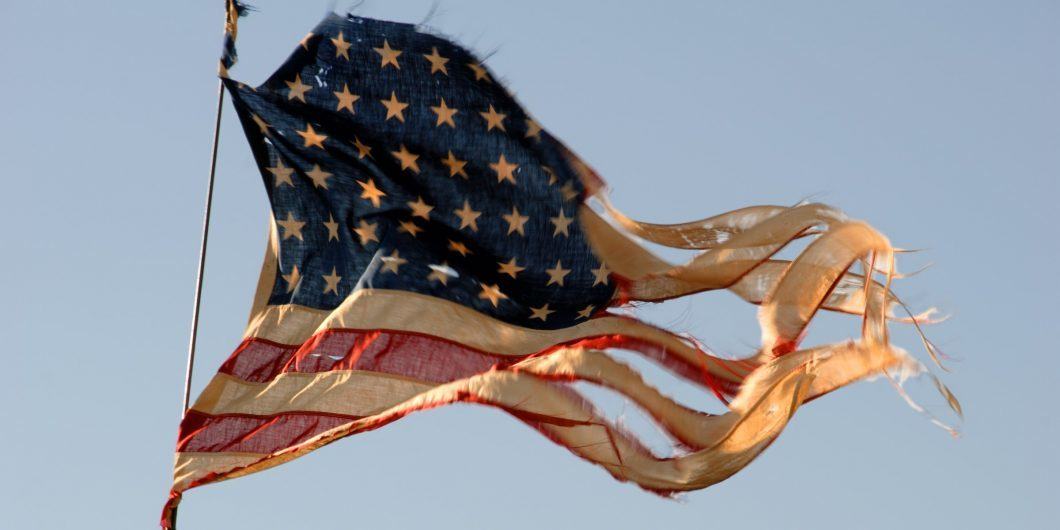 American flag tattered 1060x530.jpg