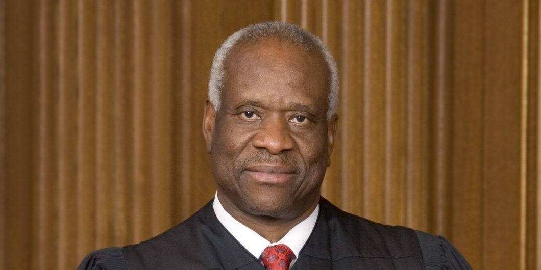 Clarence Thomas official SCOTUS portrait scaled e1633483285868 1060x530.jpg