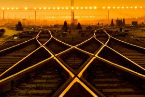Cargo train platform at sunset with container