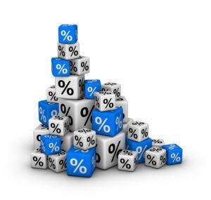 Stack of boxes with percent sign (sales or finance concept)