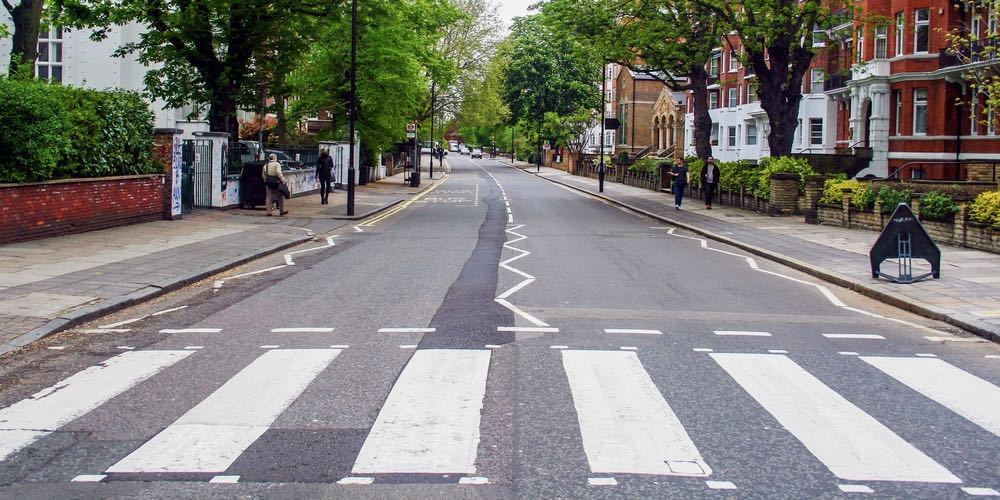 LONDON, ENGLAND   MAY 10, 2012 : The famous scenery of zebra crossing at Abbey Road made famous by the 1969 Beatles album cover