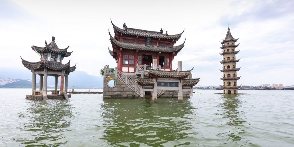 The landscape of ancient Chinese architecture archways, pavilions, terraces and towers in the center of Poyang Lake, a submerged spectacle, is located in Jiujiang City, East China's Jiangxi Province.