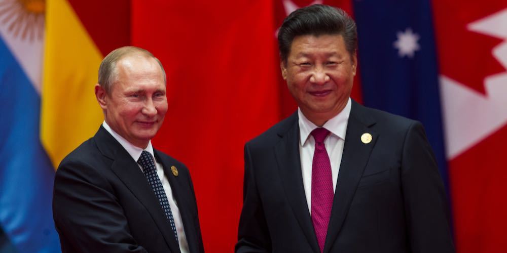 HANGZHOU, CHINA   SEPT. 4. 2016   Chinese president Xi Jinping (R) welcomes Russian President Vladimir Putin (L) in G20 summit in Hangzhou.