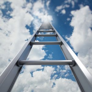 Ladder of success leading to the clouds.