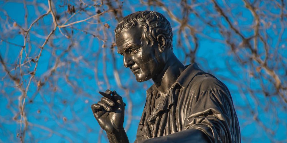 Geneva   Switzerland   03/17/2014: Bronze statue of Jean Jacques Rousseau (1712 1778) made in 1834 by James Pradier (1790 1852).