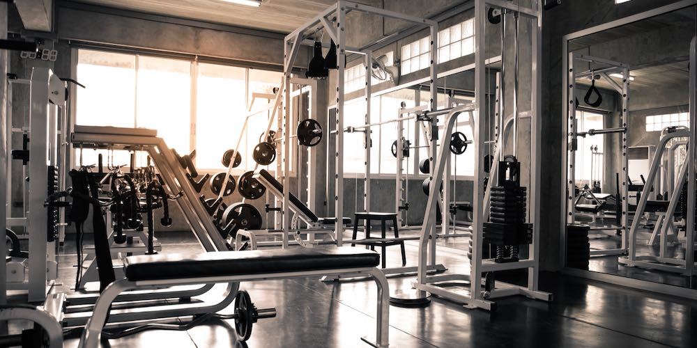 Within gym with modern fitness equipment for fitness events and more. Modern of gym interior with equipment. Sports equipment in the gym.