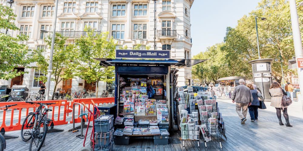 London, UK   September 13, 2018: Neighborhood district of Chelsea, street, old vintage historic traditional sidewalk square with dailymail daily mail newsstand newspaper magazine stand news