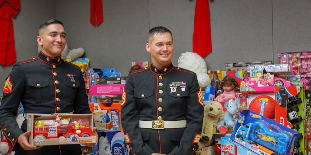 San Diego, CA / USA December 7, 2019: Marines with Toys Collected for U.S Marine Corps Reserve Toys for Tots Campaign.