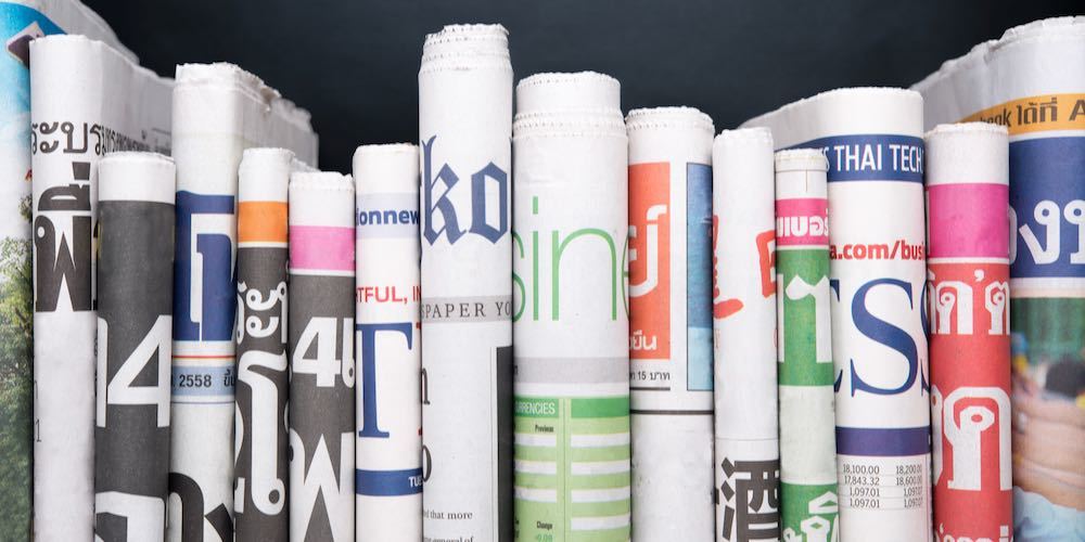 Newspapers folded and stacked