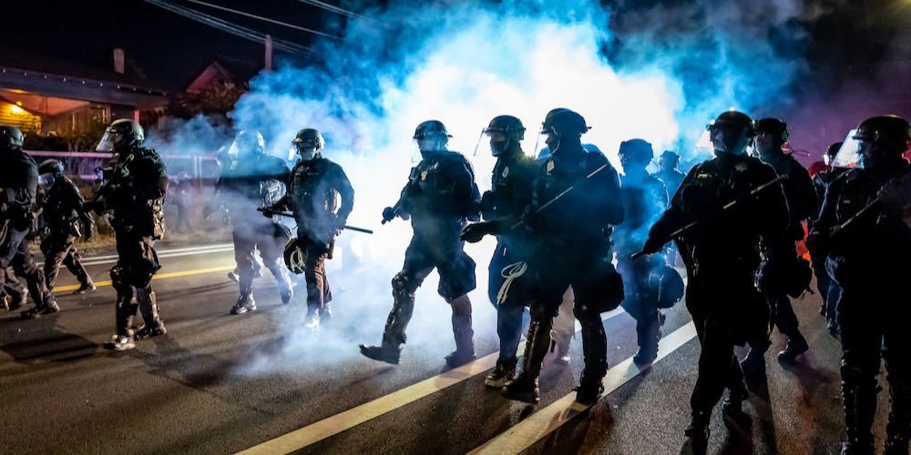 Portland protest has been ongoing since George Floyd's death. Many protesters were demanding to correct the systematic problem and defund the police. Photos were taken in Portland, OR,USA on 8/9/2020