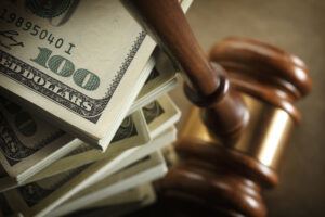 A conceptual look at money and the legal system. Shot with shallow depth of field.