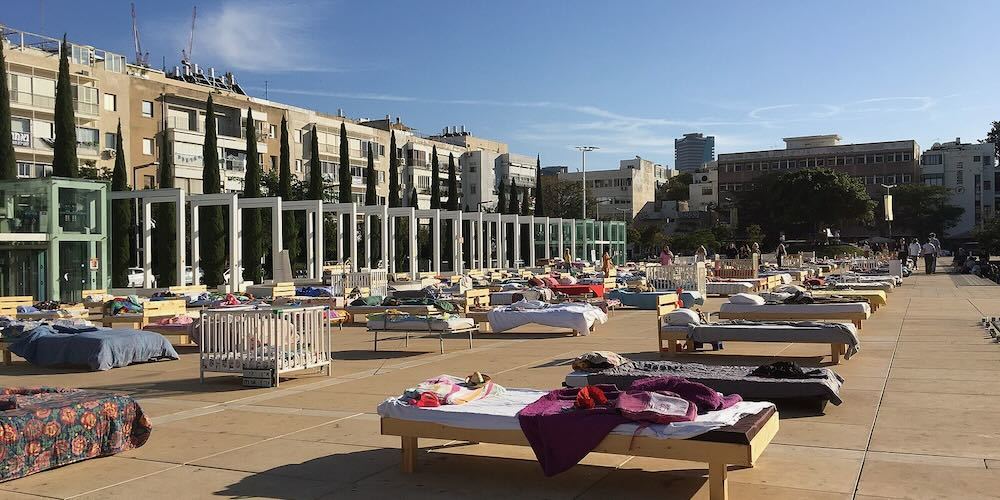 Empty Beds art installation at the Habima Square Kikar Hatarbut 7.jpeg