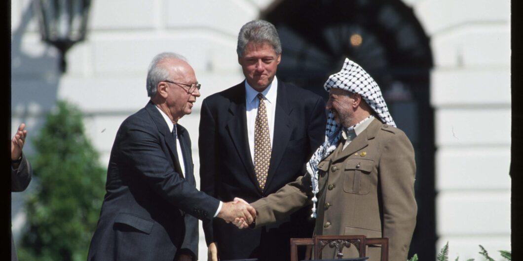 171748 01: (NO NEWSWEEK   NO USNEWS) Yasir Arafat and Israeli Prime Minister Yitzhak Rabin shake hands September 13, 1993 in Washington, DC. The political leaders attended the signing of the Middle East Peace Accords between Israel and the PLO. (Photo by Cynthia Johnson/Liaison)