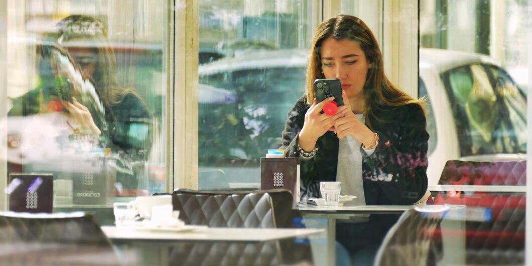 teenage girl on smartphone shutterstock 2272618071 1060x530.jpg