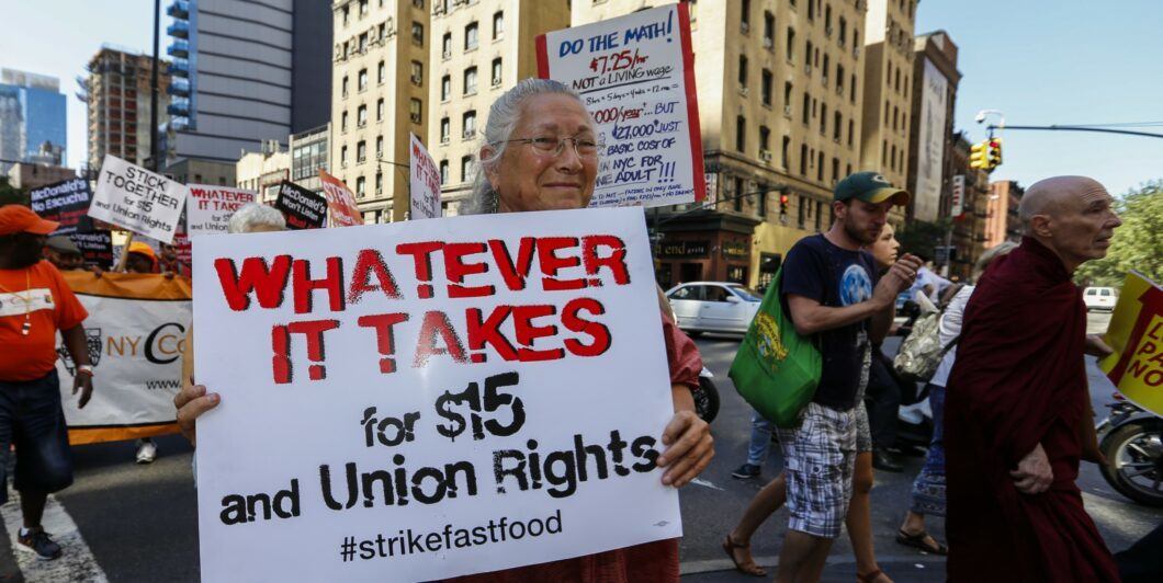 Fast food workers protest for higher wages NYC shutterstock 215115697 1060x532.jpg