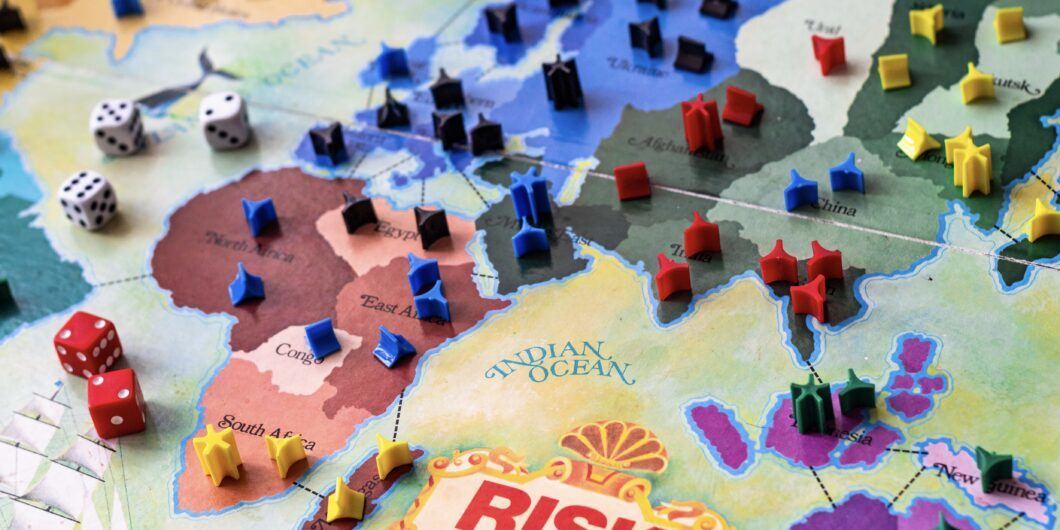 BRITISH COLUMBIA, CANADA   SEPTEMBER 14, 2019: 1975 Risk board game   With cards, dice, and tokens