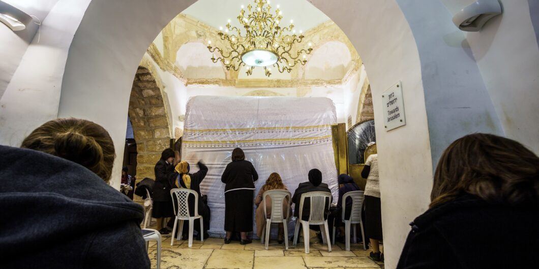 Jerusalem. Israel   November 3, 2015: Women praying in Rachel's Tomb Synagogue, Jerusalem, Israel