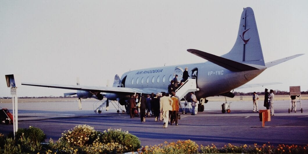 Bulawayo airport. Bulawayo, Rhodesia(Zimbabwe) circa 1978. Passengers board an Air Rhodesia Viscount airplane.
