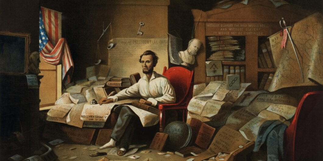 President Lincoln writing the Proclamation of Freedom 18444u 1060x530.jpg
