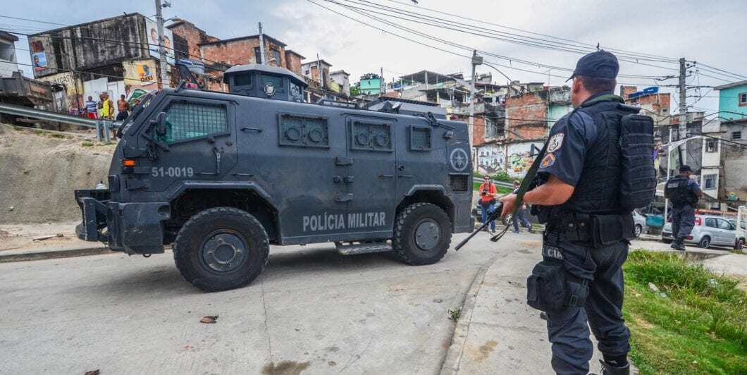 RIO DE JANEIRO. BRAZIL, MARCH, 21, 2015   Rio de Janeiro military police patrolling the slum complex of the German's heavily armed and armored vehicle complex
