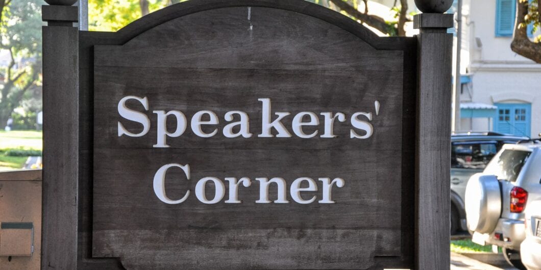 Singapore, Singapore   May 8, 2009: Speakers' Corner, a vibrant symbol of free speech, stands surrounded by lush greenery, inviting discussions and community engagement.