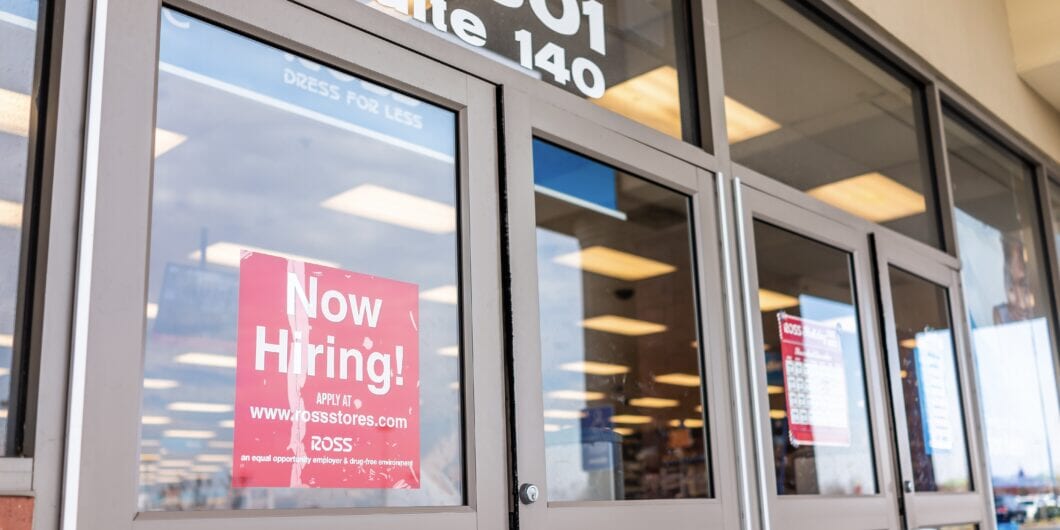 Sterling, USA   November 21, 2019: Ross storefront with sign by entrance of store in Fairfax county, Virginia for hiring