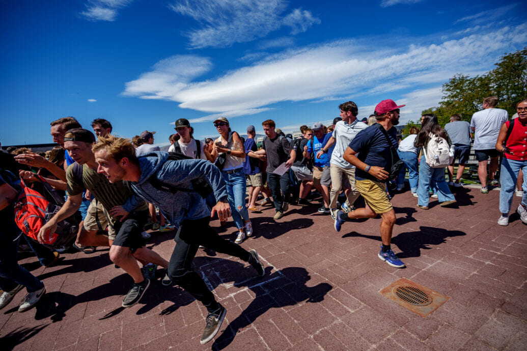 OREM, UTAH   SEPTEMBER 10: People run after shots were fired during an appearance by Charlie Kirk at Utah Valley University on September 10, 2025 in Orem, Utah.  Kirk, founder of Turning Point USA, was speaking at his 