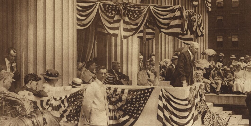 Woodrow Wilson delivering Flag Day address 1915 e1758684167847 1060x532.jpg