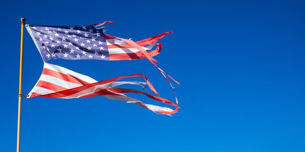 Torn flag e1762221319933 1060x530.jpg