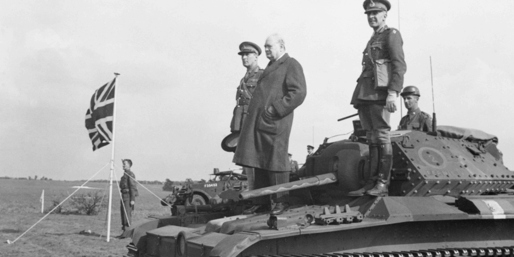 Churchill standing on a tank 1060x530.png